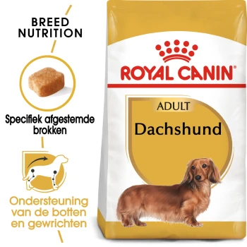 Royal Canin Adult Dachshund hondenvoerzak, met specifieke voedingsdetails voor het ras, een illustratie van brokjes en tekst in het Nederlands over gewrichtsondersteuning.