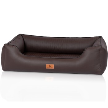 Braunes Hundebett mit schlankem Design, das ein geripptes Innenleben und ein lederähnliches Äußeres aufweist, beschriftet mit 'KNUFFERWUFF.'