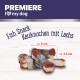 Premiere Ich liebe meinen Hund Fischsnack Kauknocken mit Lachs, mit fischförmigen Hundeleckerlis, die ungefähr 6 cm mal 2,5 cm messen.