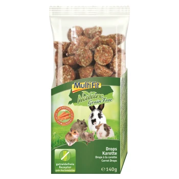 Carrot-flavored pet treats in a clear bag, labeled "MultiFit Nature Grain Free," featuring small animals like a rabbit, guinea pig, and hamster.