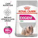 Royal Canin Exigent Mini Hundefutterbeutel mit einer Illustration eines kleinen Hundes, mit Text, der Pflegeernährung und Zufriedenheit mit Vorlieben hervorhebt.