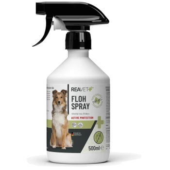 Flasche REAVET Flohspray (500ml) mit einem Hundebild, beschriftet mit "Sofort Effekt" und "Aktiver Schutz", hergestellt in Deutschland.