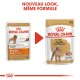 Image de deux sachets de nourriture pour chiens Royal Canin pour poodles adultes, présentant un nouveau design avec le texte "NOUVEAU LOOK, MÊME FORMULE."