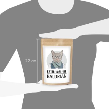 Eine 22 cm hohe Verpackung von "Kater Kasimir Baldrian", mit einer Cartoon-Katzenillustration auf einem weißen Hintergrund mit einem Kraftpapier-Rand.