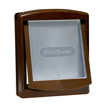 Porte pour animaux de compagnie PetSafe marron avec un clapet transparent, conçue pour un accès facile pour les animaux.