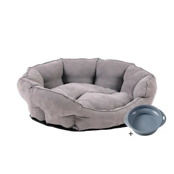 ® Hundebett, Katzenkorb mit Gratis-Wassernapf Ein plüschiges graues Haustierbett in runder Form und mit gepolstertem Design, begleitet von einer grauen zusammenklappbaren Haustierschüssel.