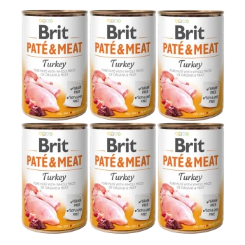 Sechs Dosen Brit Paté & Fleisch für Haustiere, mit Truthahn, mit Etiketten, die "Getreidefrei" und "Soja- & GMO-frei" angeben.