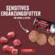 FLEISCHESLUST Steakhouse 'Büffel Pur' Rolle, Pastetenscheiben und rohe Fleischwürfel; sichtbarer Text: 'SENSITIVES ERGÄNZUNGSFUTTER'.