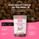 NatureHolic AXOLOTL FEED-Beutel mit Axolotl-Motiv vor Pellet-Hintergrund; deutscher Text 'Gönn deinem Axolotl nur das Beste.'