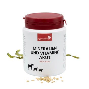 Weißer Behälter des Haustierergänzungsmittels Herzenstier Mineralien und Vitamine Akut mit rotem Deckel und Tier-Silhouetten auf dem Etikett.