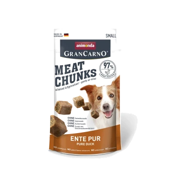Emballage de morceaux de viande GranCarno pour animaux de compagnie, présentant la saveur 'Canard Pur', 97 % non-protéine, et des affirmations sans grains ni sucres ajoutés.