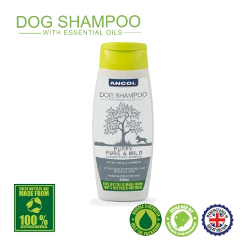 Bottle of Ancol Dog Shampoo with essential oils, labeled "Puppy Pure & Mild," 200ml, featuring eco-friendly claims and a tree graphic.