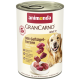 Boîte de nourriture pour chien Animonda GranCarno Adult 1+ avec cœurs de volaille, présentant un golden retriever et les avantages du produit en allemand et anglais.