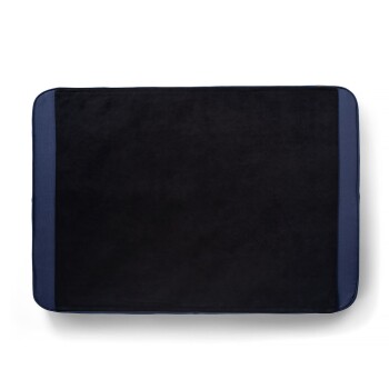 Schwarzes Hundebett mit weicher Oberfläche und blauen Akzenten, entworfen für Komfort und Stil.