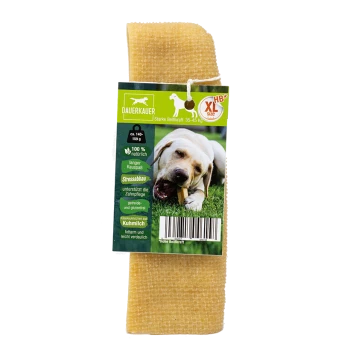 Opakowanie gryzaka dla psów z labradorem żującym produkt, oznaczone "DAUERKAUER," z informacjami o naturalnych składnikach i korzyściach.