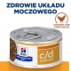 Puszka mokrej karmy dla kotów Hill's Prescription Diet c/d Multicare, z etykietą z kurczakiem i warzywami, z polskim tekstem "Zdrowie układu moczowego."