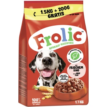 Eine rote Tüte Frolic-Hundefutter, die einen lächelnden Hund und eine Schüssel mit Kroketten zeigt. Der Text hebt "1,5KG + 200G GRATIS" und "100% VOLLSTÄNDIG" hervor.