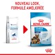 Deux sacs de nourriture pour chiens : à gauche "Pediatric Starter Large Dog", à droite "Royal Canin Starter Mother & Babydog", sur un fond bleu avec des chiots.