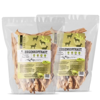 Zwei transparente Tüten mit Hundeleckerlis, beschriftet mit "Ziegenkopfhaut" und einem grünen und gelben Design, die getrocknete Ziegenhaut zeigen, jeweils 600g.