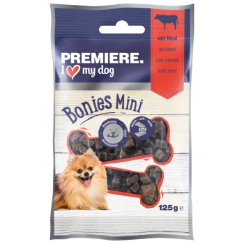 Emballage de friandises pour chiens "Premiere I Love My Dog Bonies Mini" (125g) avec un Pomeranian souriant et des friandises en forme d'os, étiqueté en allemand et en anglais.