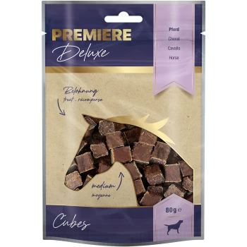 Friandises pour chevaux Premiere Deluxe dans un sac refermable de 80g, présentant des collations en forme de cube marron et un texte indiquant "treat" et "medium."