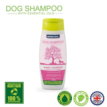 Ancol Dog Shampoo with Essential Oils, 200ml bottle, labeled "Baby Powder," featuring a tree and dog graphic. Claims to be extra-mild with aloe vera.