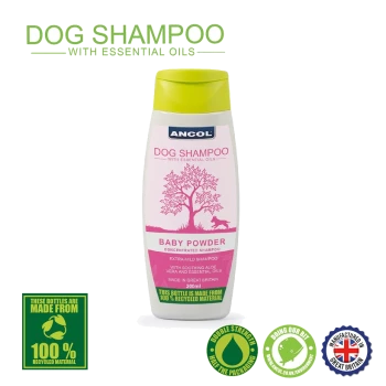 Ancol Dog Shampoo with Essential Oils, 200ml bottle, labeled "Baby Powder," featuring a tree and dog graphic. Claims to be extra-mild with aloe vera.