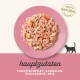 Hundefutter auf einem rosa Teller mit Thunfischfilet, Garnelen, Fischbrühe und Reis, mit dem Text "100% NATÜRLICHE ZUTATEN".