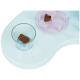 Plateau-puzzle pour animaux bleu étiqueté «AniOne wild variety» avec coupe transparente contenant une friandise brune et un insert violet à bouton.