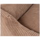 Nahaufnahme eines weichen, gerippten Haustierbettes in warmem Beige, das seine plüschige Textur und sein gemütliches Design zeigt.
