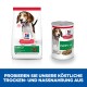 Die Verpackung von Hill's Science Plan Welpenfutter, die einen Beutel mit Trockenfutter und eine Dose mit Nassfutter zeigt, beide beschriftet mit 'Welpe <1'.