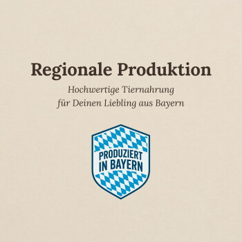 Beige Anzeige: 'Regionale Produktion', Untertext 'Hochwertige Tiernahrung', blaues bayerisches Wappen 'Produziert in Bayern'.