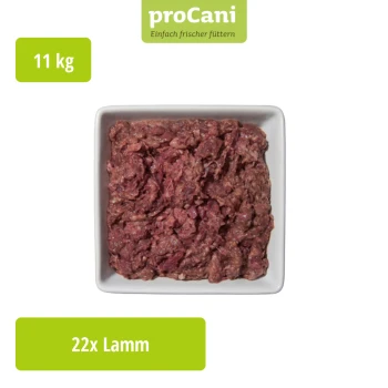 Verpacktes Hundefutter mit der Bezeichnung "proCani Lamm-Mix" und einem Foto eines Schafes, mit einem grünen Landschaftshintergrund und einem "22x"-Abzeichen.