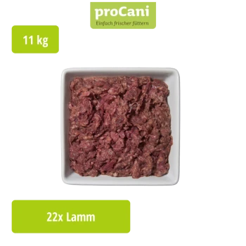 Verpacktes Hundefutter mit der Bezeichnung "proCani Lamm-Mix" und einem Foto eines Schafes, mit einem grünen Landschaftshintergrund und einem "22x"-Abzeichen.