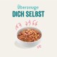 Schüssel mit Haustierfutter, gefüllt mit gehacktem Fleisch und Gemüse, mit dem Text "Überzeuge DICH SELBST" darüber.
