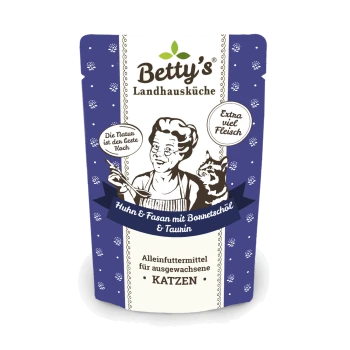 Betty's Landhausküche Katzenfutterverpackung mit einem Koch und einer Katze, gekennzeichnet "Huhn & Fasan mit Boneteschöl & Taurin," mit "Extra viel Fleisch."