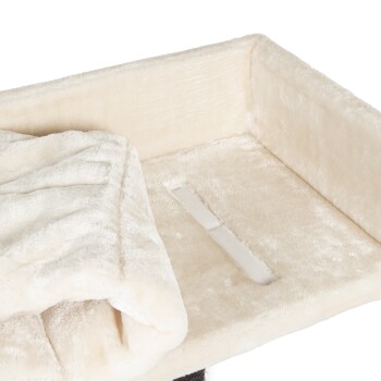 Ein weiches, cremefarbenes Haustierbett mit erhöhten Rändern und einer gefalteten, plüschigen Decke oben, entworfen für Komfort und Wärme.