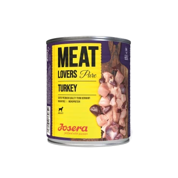 Dosen-Hundefutter mit der Aufschrift 'Meat Lovers Pure Turkey' mit Stückchen von Putenfleisch, mit dem Text 'Super Premium Qualität aus Deutschland' und 'Getreidefrei'.