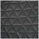 Nahaufnahme eines strukturierten grauen Stoffes mit einem geometrischen Muster aus kleinen Dreiecken.