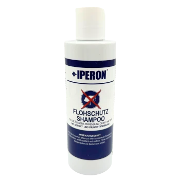 Weiße Flasche mit Aufschrift 'IPERON FLOHSCHUTZ SHAMPOO', rotes durchgestrichenes Floh-Symbol und deutscher Text.