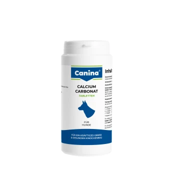 Weiße Canina-Flasche mit 'Calcium Carbonat Tabletten' für Hunde mit blauer Hundesilhouette; Etikett: 'Canina', 'Calcium Carbonat Tabletten', 'Für Hunde'.