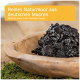 Natürliches schwarzes Moor in einer Holzschüssel, mit dem Text "Reines Naturmoor aus deutschen Mooren" und "Natural moor from German moors."