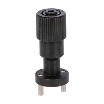 Ersatzpumpenteil für einen schwarzen Haustier-Wasserbrunnen mit einem strukturierten Knopf und zwei Metallstiften an der Basis.