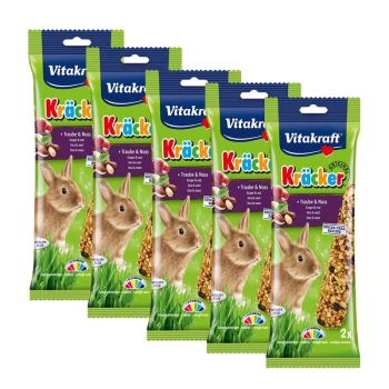 Four packages of Vitakraft Kräcker for rabbits, featuring a rabbit image, with text indicating "Traube & Nuss" (Grape & Nut) and "Sugar Free Recipe."