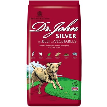 Hundefuttertüte mit der Aufschrift "Dr. John Silver mit Rind und Gemüse," 15kg, mit einer Illustration eines laufenden Hundes und ernährungsbezogenen Angaben.