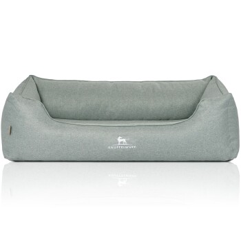 Hellgraues Hundebett mit hohem Rücken und weichen Seiten, mit dem Logo "KNUFFELWUFF" in Weiß auf der Vorderseite.