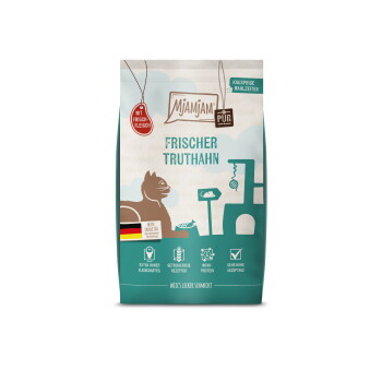 Mjamjam-Katzenfutterbeutel mit der Aufschrift 'Frischer Truthahn', Katzensilhouette, deutscher Flagge und 'Mit Frischfleisch'-Kennzeichnung.