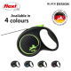 A black retractable dog leash with a green handle, shown with blue, pink, and black options. Text: "Available in 4 colours."