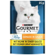 Weiße flauschige Katze auf einem blauen Hintergrund, mit einer Verpackung von Purina Gourmet Katzenfutter, 85g, beschriftet mit "Perle" und Text in Deutsch.