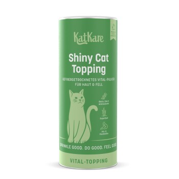 Grüne KatKare-Dose mit der Aufschrift 'Shiny Cat Topping', Katzenillustration, 'Vital-Topping' und dem Slogan 'Sprinkle good. Do good. Feel good.'
